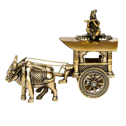 Golden Brass Lord Krishna Idol Sitting In Bullock Cart Showpiece